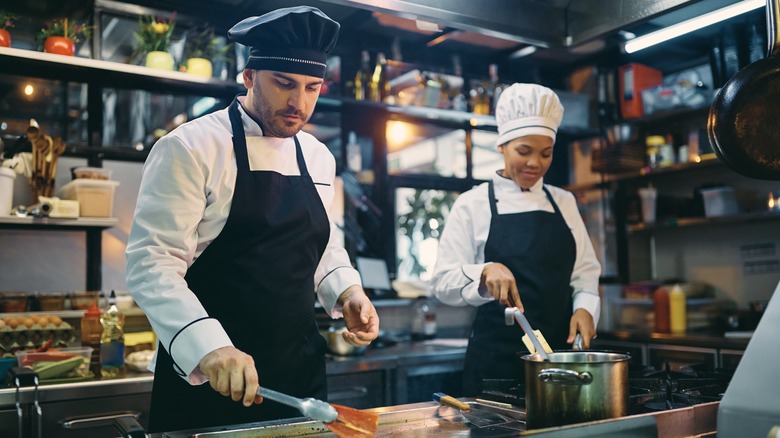 Food truck chefs working together