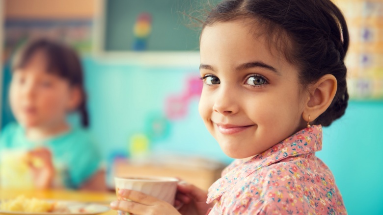 child drinking milk