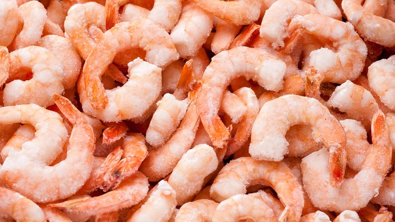 Pile of frozen cooked shrimp