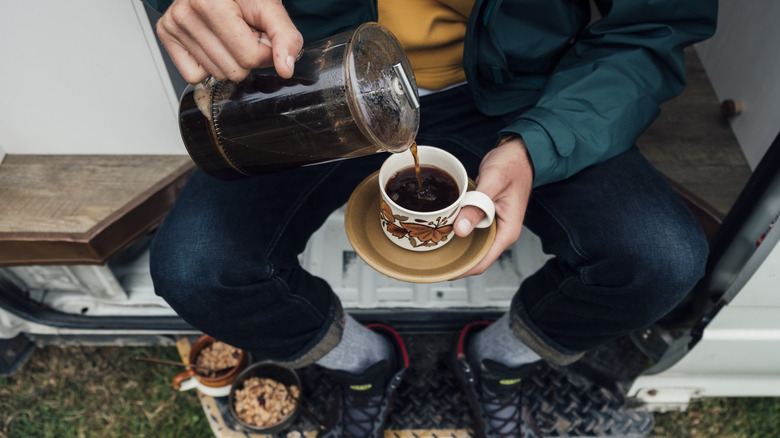 Man pouring from French press