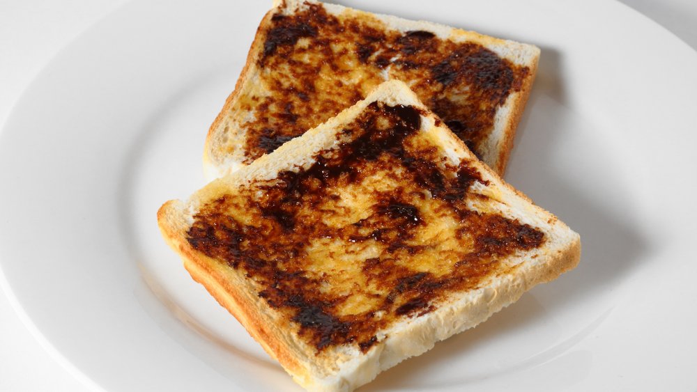 Marmite or Vegemite spread thinly on toast