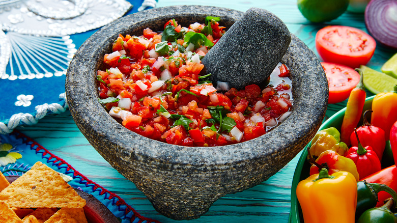 Pico de gallo salsa in a mortar