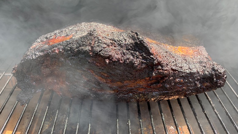 Brisket on smoker grates