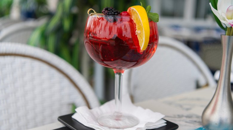 Generous glass of sangria with fruit and ice