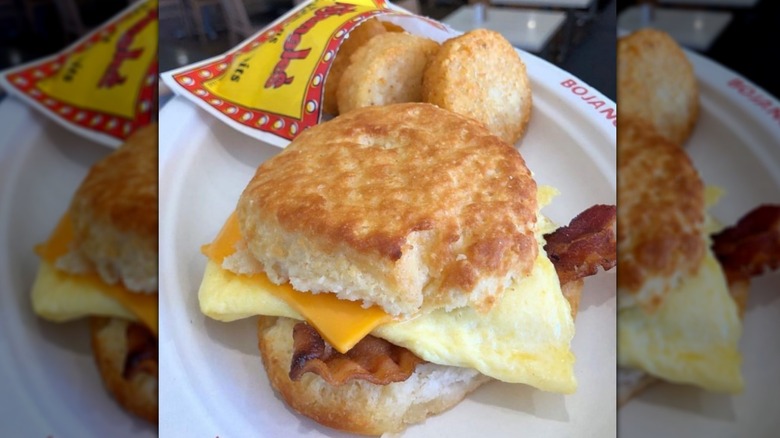 bacon, egg and cheese biscuit with hash browns