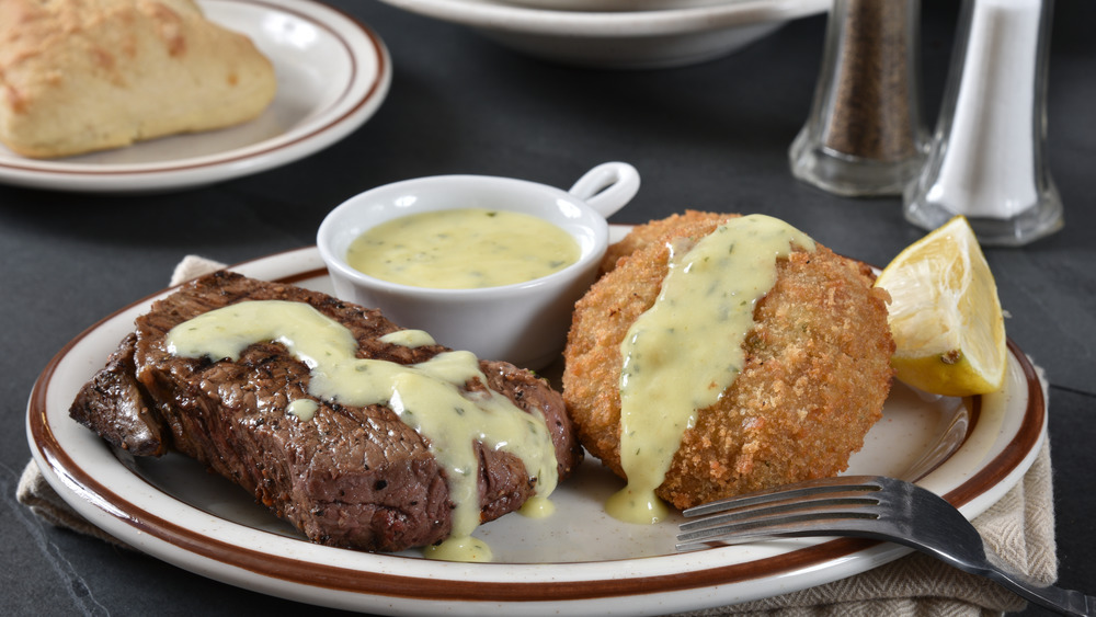 Filet mignon, crab cakes, and bearnaise sauce