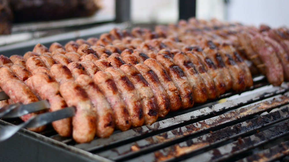 Sausages cooking on a grill