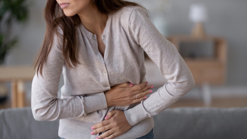 Woman with stomach problems