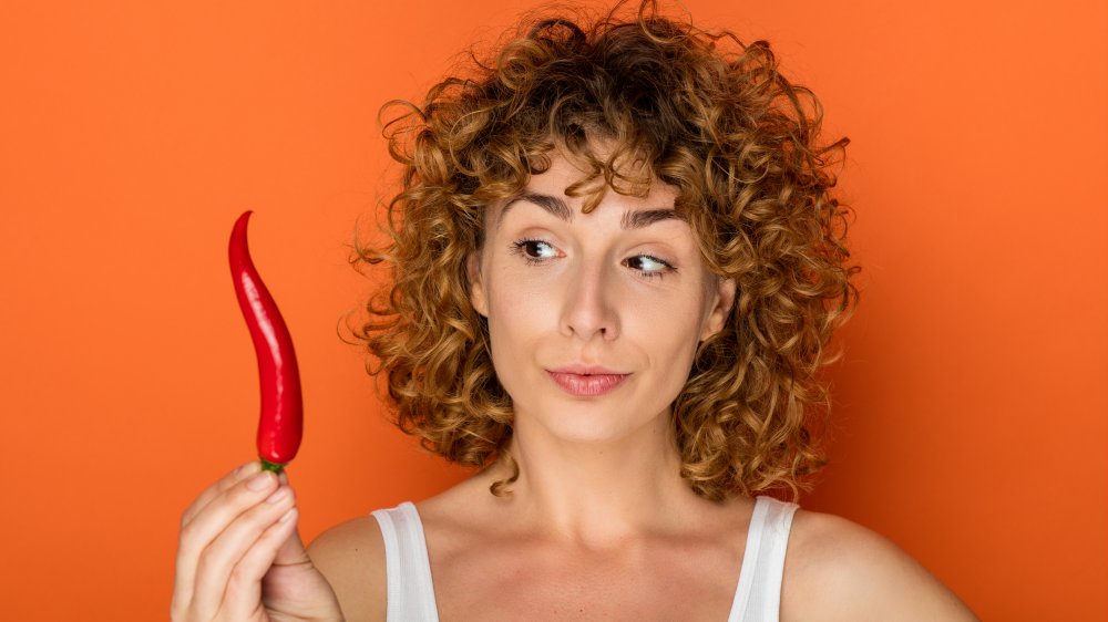 Woman with chili pepper