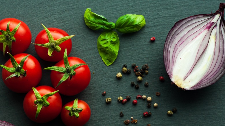 Tomatoes, basil, onions and peppercorns 