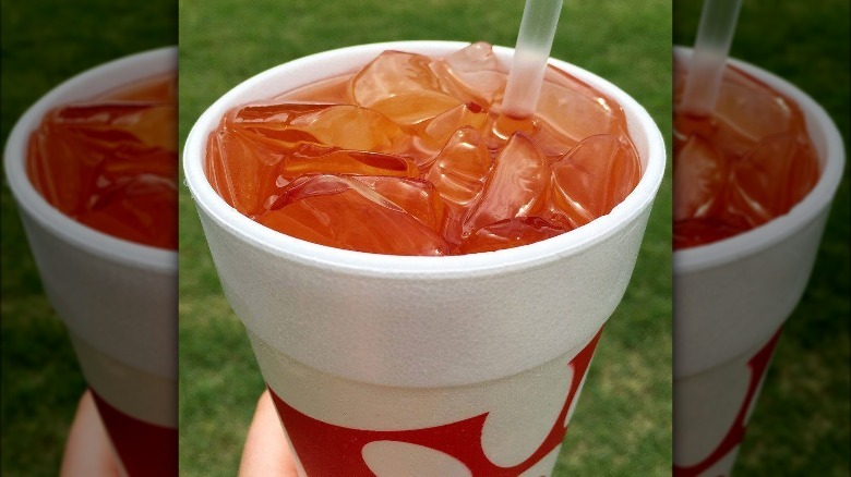 Chick-fil-A iced tea in cup with lid off