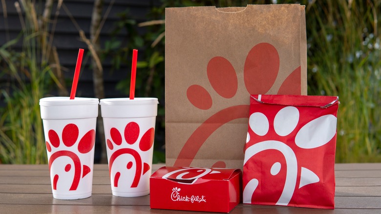 Chick-fil-A meal with two drinks on picnic table