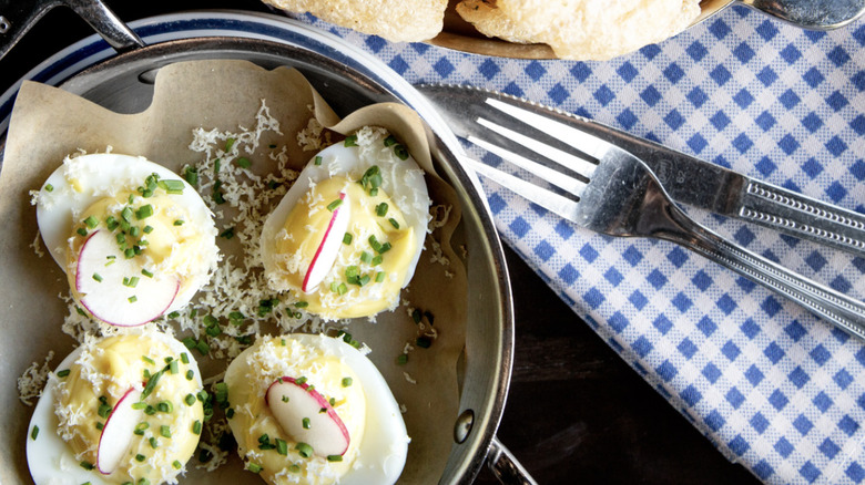 Pot holding deviled eggs