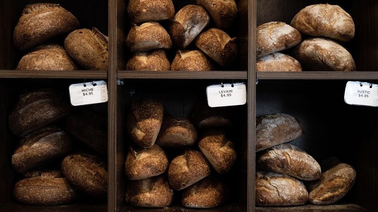 assorted bread on shelves