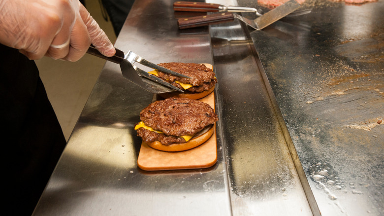 Steak N' Shake steakburger on grill