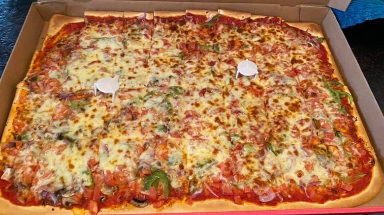 large square pizza in box