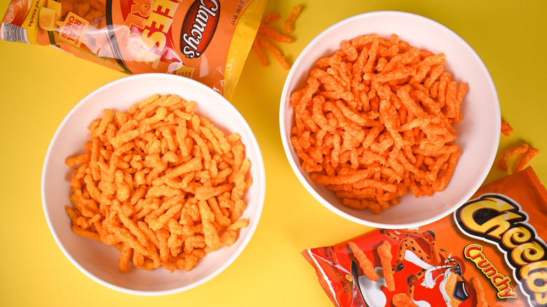 bowls of Cheetos Crunchy and Aldi brand Clancy's Cheese Curls