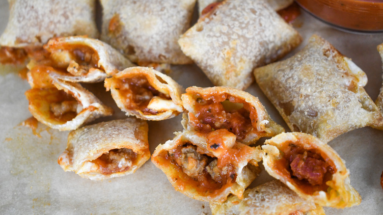 pizza rolls cut open to show filling