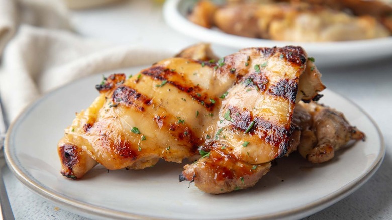 grilled chicken thighs on a plate