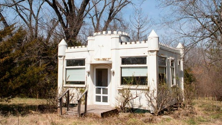 White castle building in woods