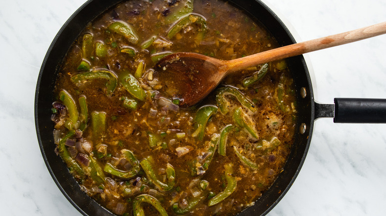 veggies and chicken in skillet 