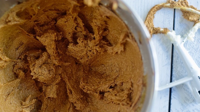 wet gingersnap dough in stand mixer bowl