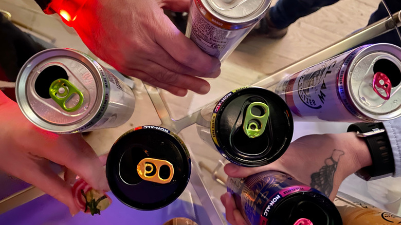 A table with a variety of White Claw cans at the at tasting event