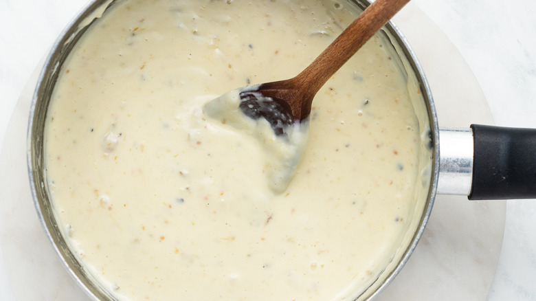 white queso in a saucepan