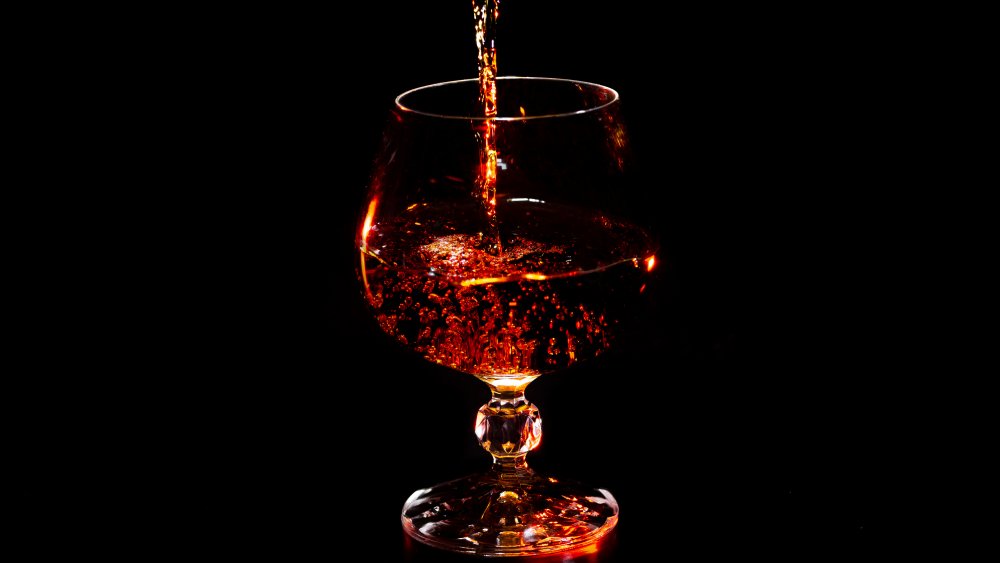 Cognac pouring into a glass