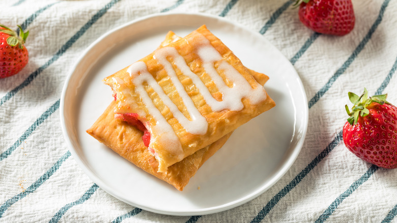 Toaster Strudel on a plate with strawberries