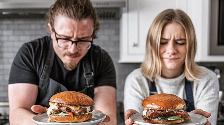 Joshua and Kate Weissman with burgers 