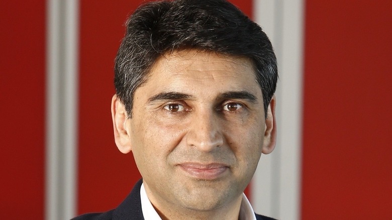 KFC CEO Sabir Sami smiling