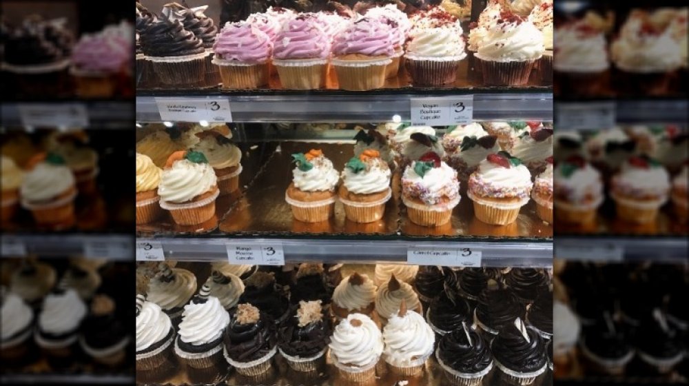 Cupcakes in a Whole Foods display case