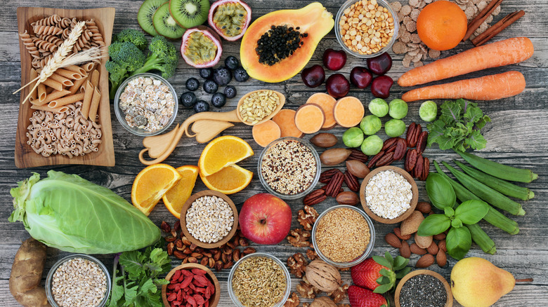 An array of fruits and vegetables on a table. 