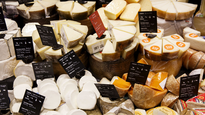 Cheeses on display at a Whole Foods