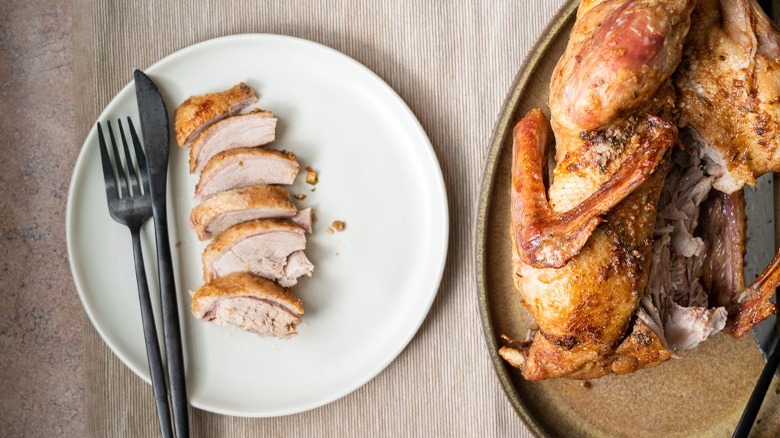 sliced duck meat on plate