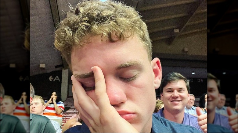 Close up of Todd Drummond sleeping at graduation