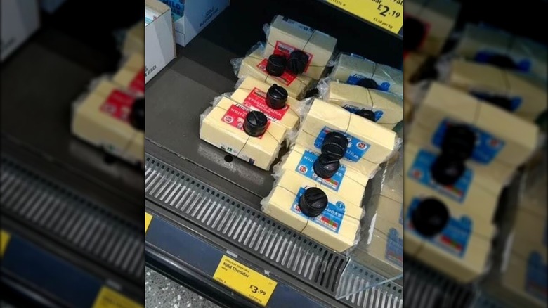 security locks on cheese wedges at Aldi UK store