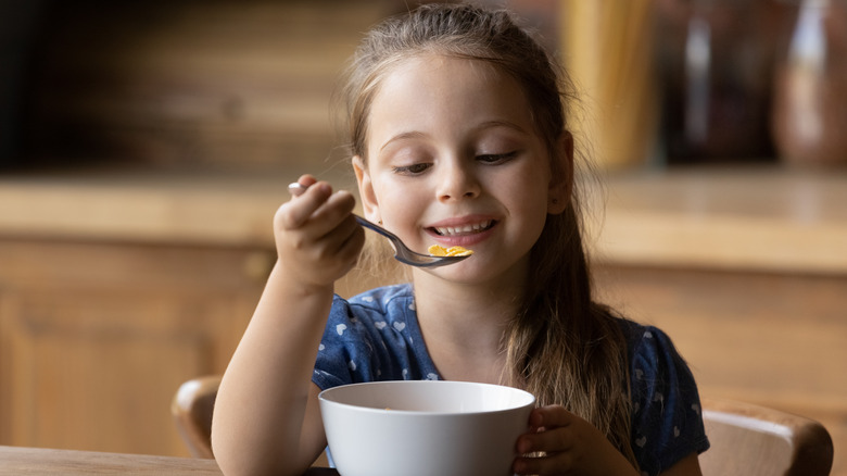 Child with cereal