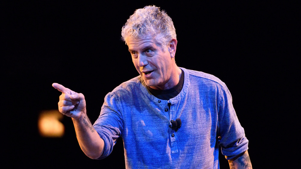 Anthony Bourdain points his finger