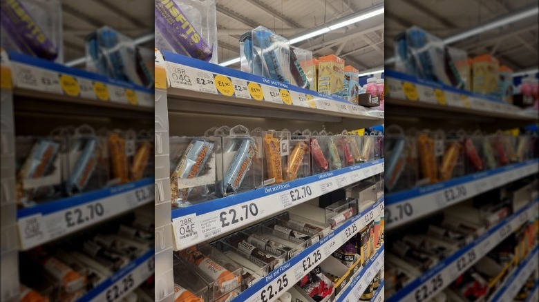 Protein bars in locked boxes at a store