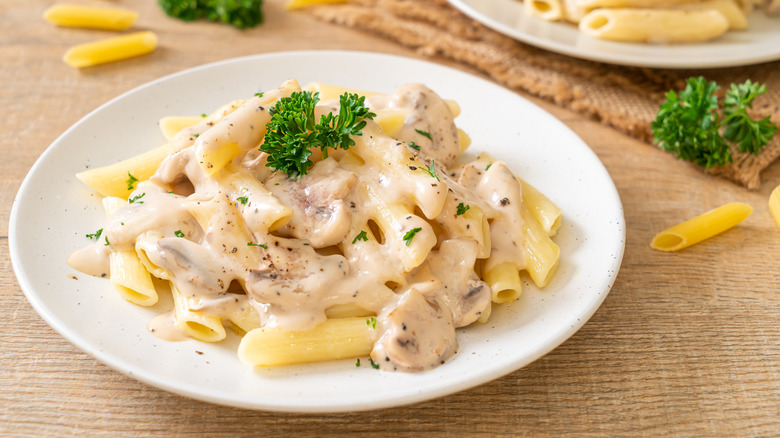 Carbonara on white serving dish