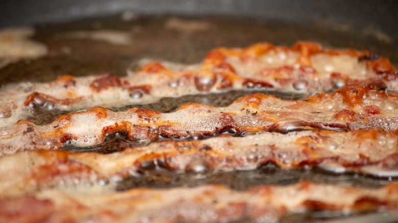 Bacon cooked in water