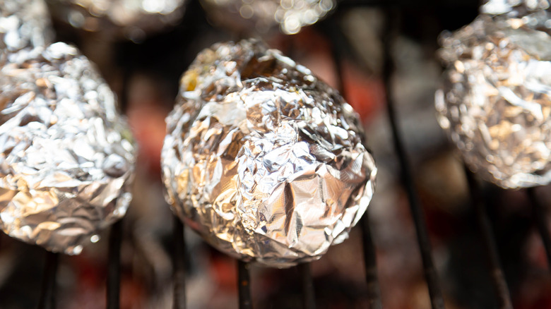 foil-wrapped baked potato