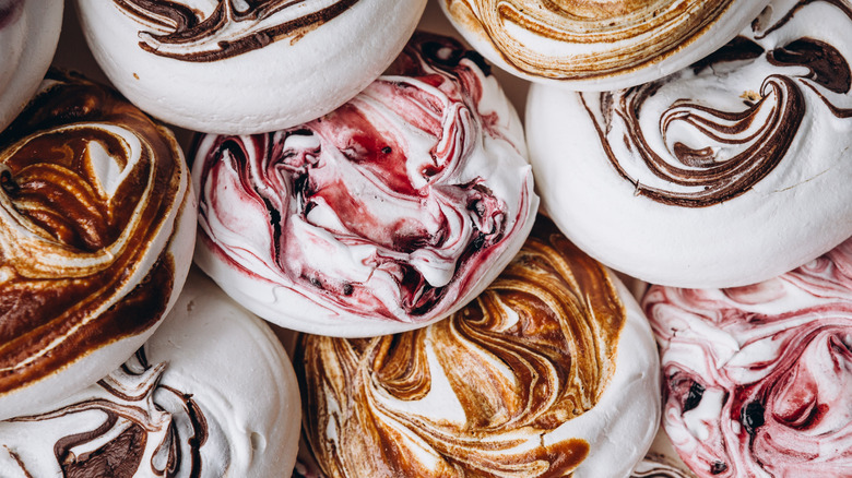 Stack of different colored meringue candies