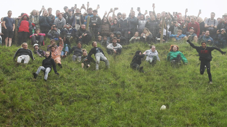 Competitors in cheese rolling contest