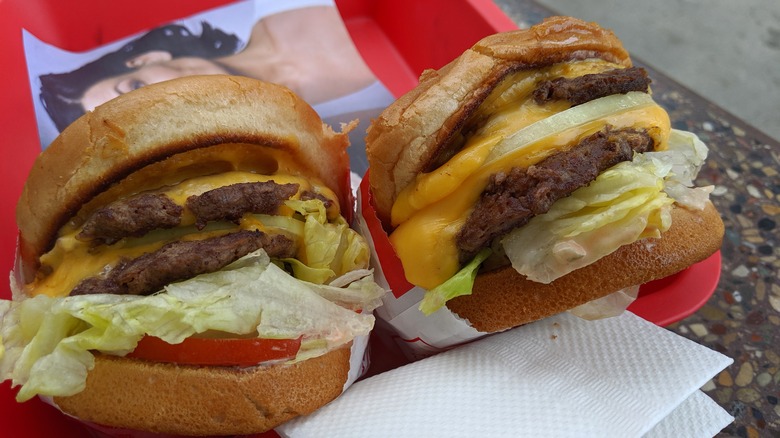 Fast food hamburgers on a red tray