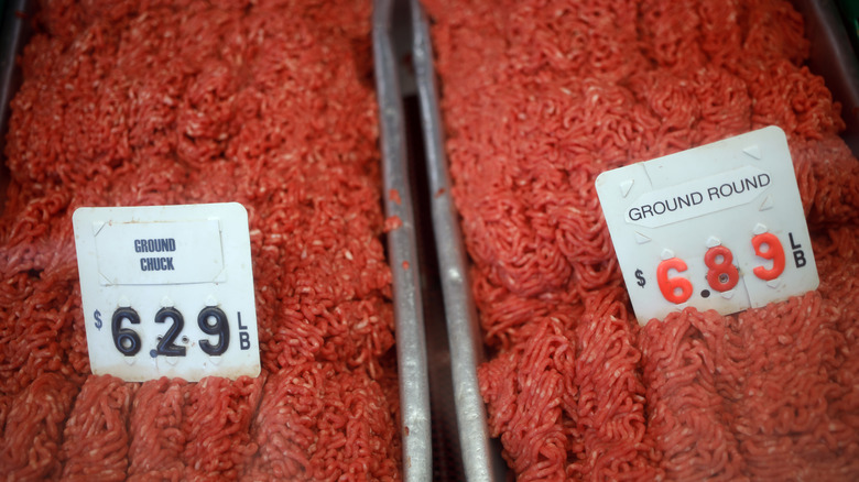 Bins of ground beef in butcher shop