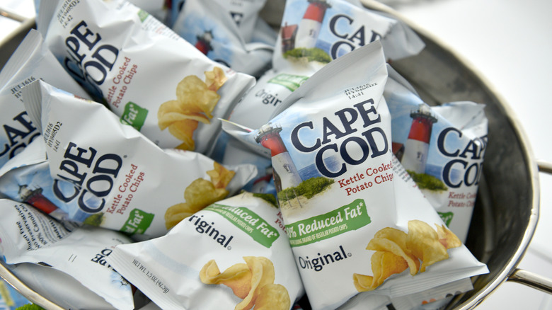 Bags of Cape Cod chips in a bucket