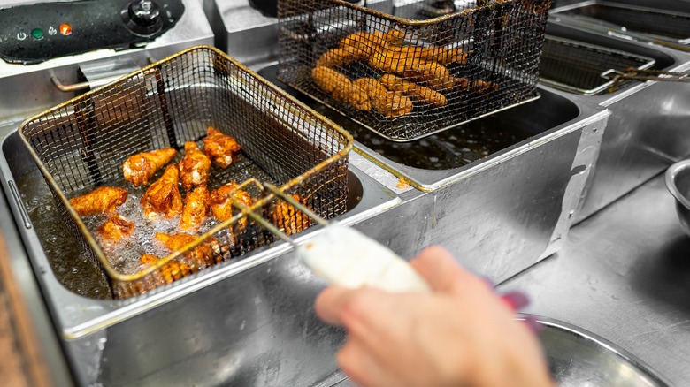 Chicken wings in deep fryer